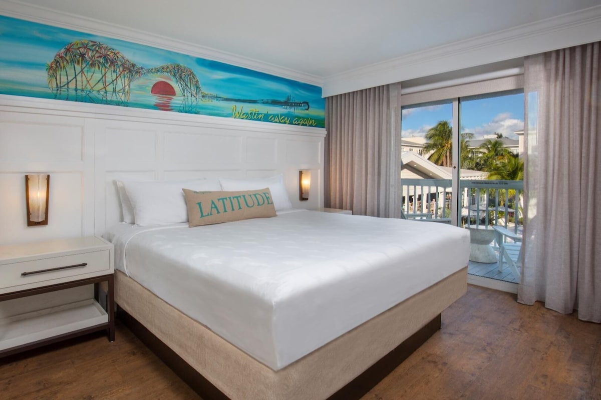 Hypo-allergenic bedding available, down comforters, in-room safe