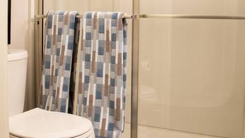 Combined shower/tub, hair dryer, towels, soap