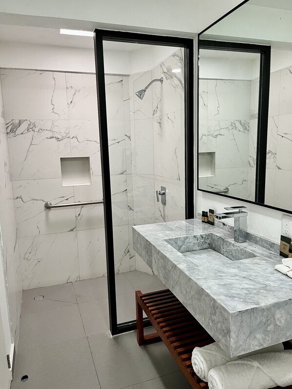 Shower, hair dryer, towels, soap