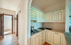 Fridge, microwave, stovetop, cookware/dishes/utensils