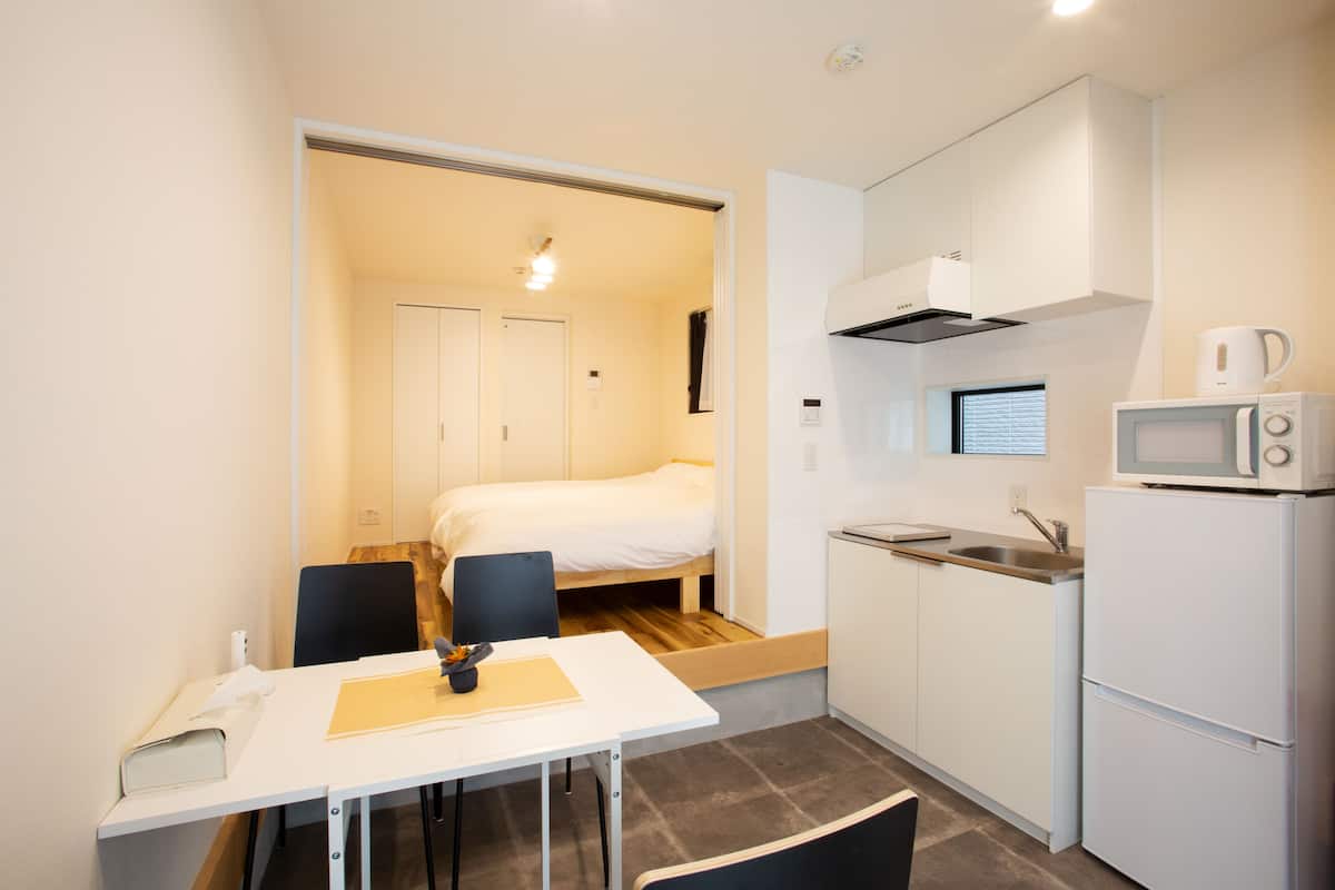 Park & Stay 1F Non-smoking | 1 bedroom, desk, laptop workspace, iron/ironing board