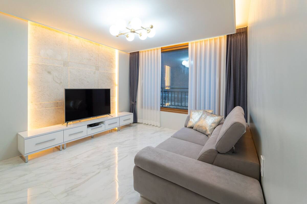 Poolvilla 202 | Living area | Flat-screen TV