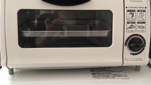 A PIERIA branded toaster oven with a cooking menu and a timer dial. - Bell Air OKUBO 203 (Tokyo)