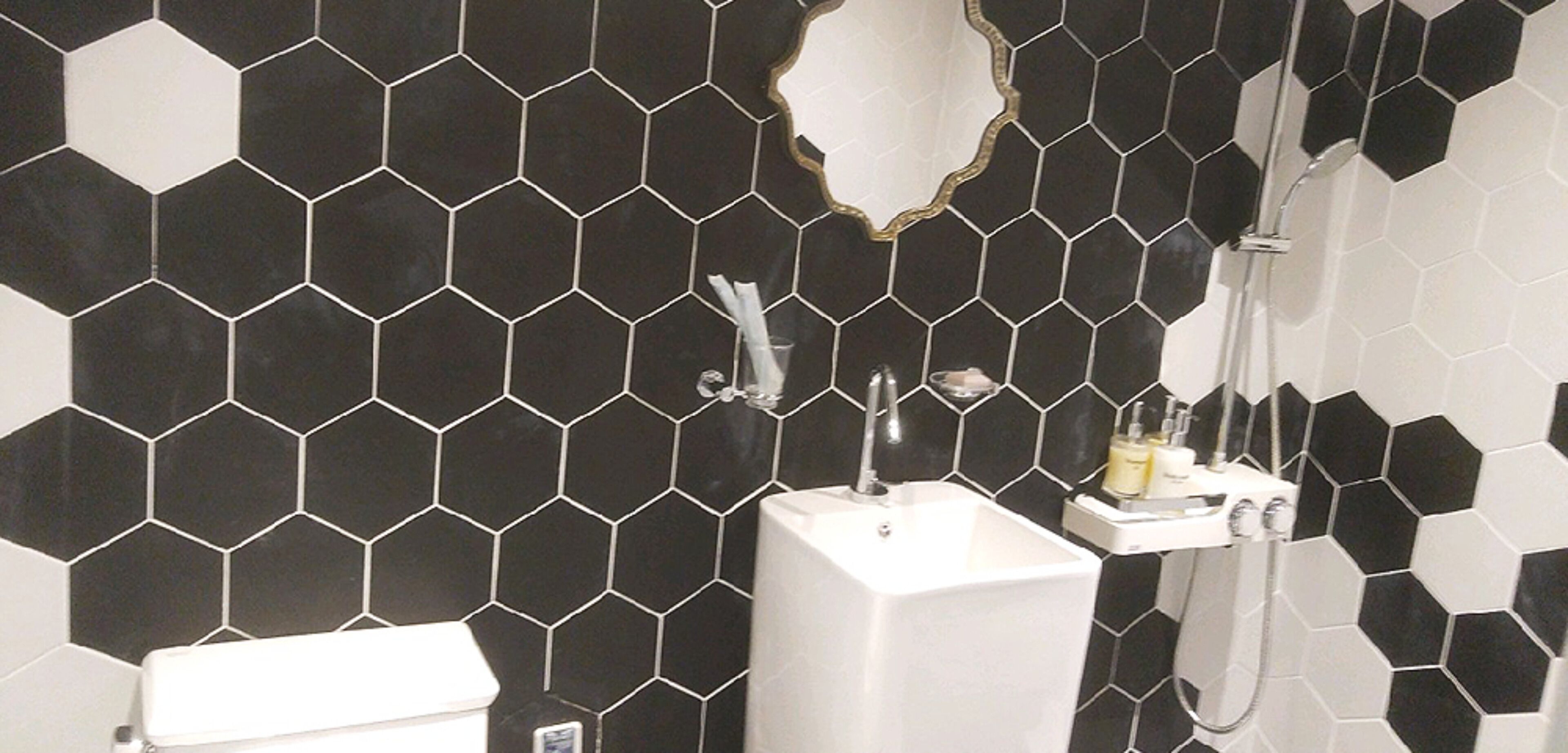 duplex, 1 bedroom (red pop / orange pop) | bathroom | shower, hair dryer, slippers, towels