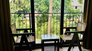 Deluxe Double Room, Pool View | 1 bedroom, in-room safe, individually decorated, individually furnished