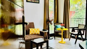 Suite Junior | Coin séjour | Télévision de 32 pouces avec chaînes par câble