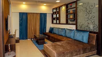 Apartemen | Area keluarga | TV layar datar