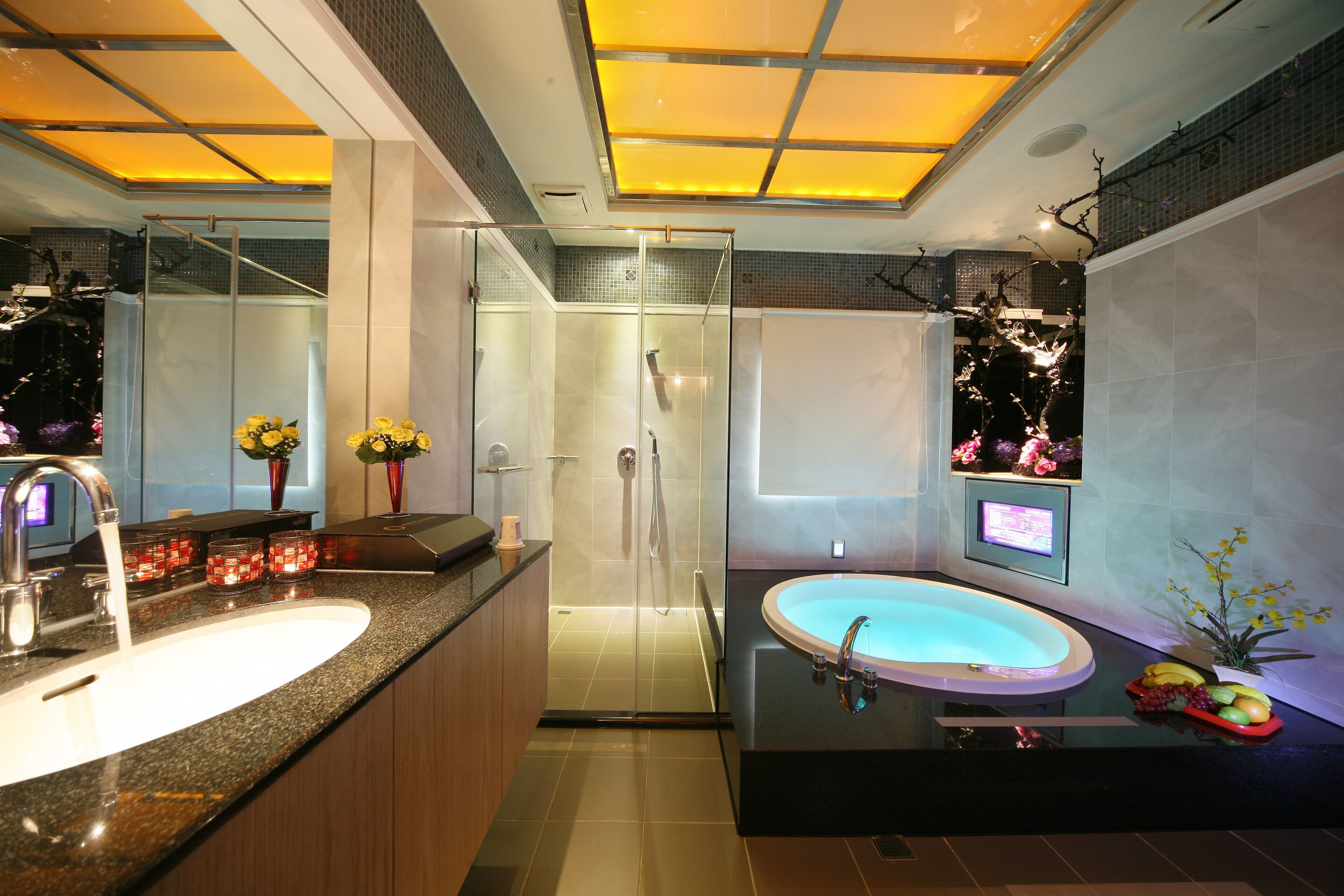 separate bathtub and shower, hair dryer, slippers, towels