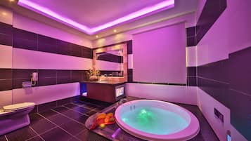 Separate bathtub and shower, hair dryer, slippers, towels