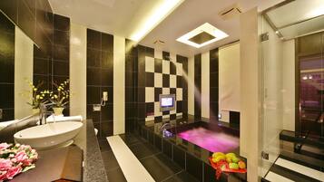 Separate bathtub and shower, hair dryer, slippers, towels