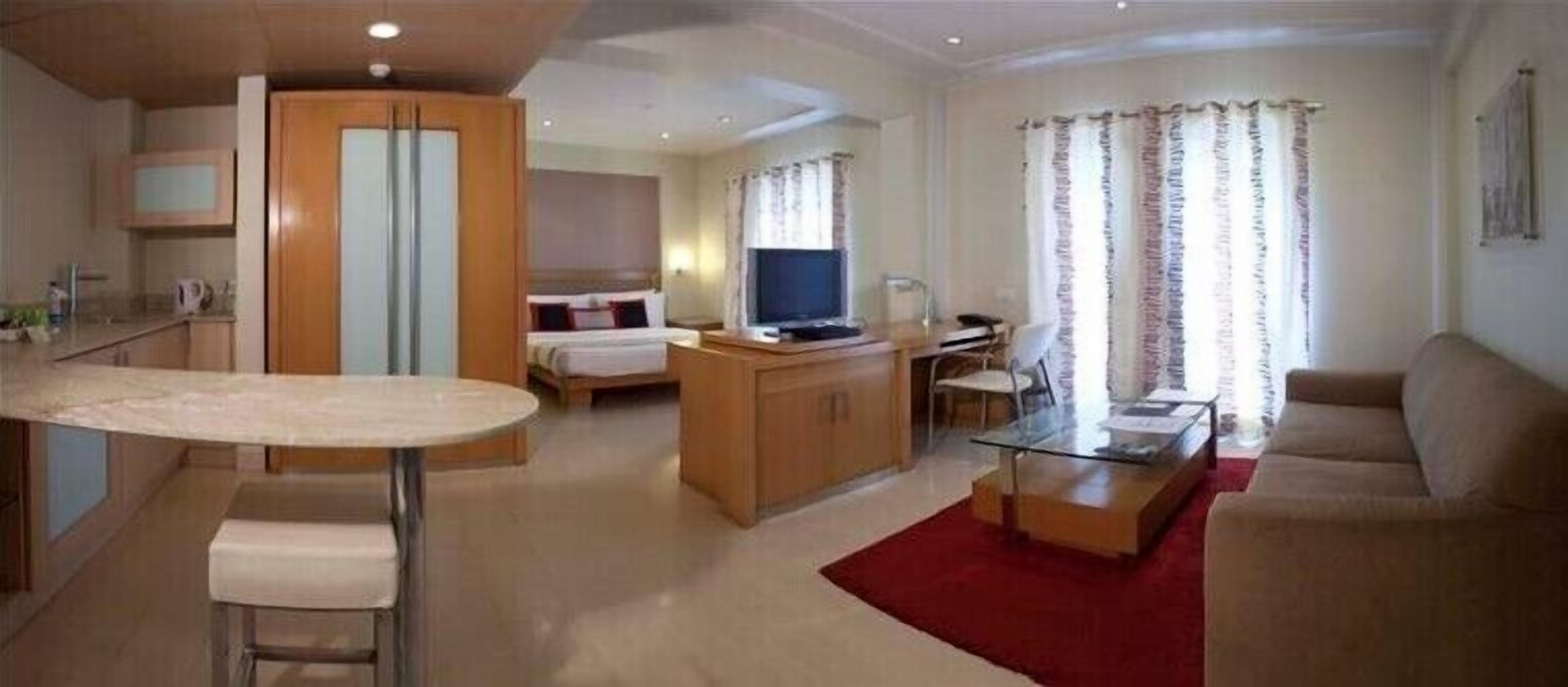 Desk, laptop workspace, blackout curtains, iron/ironing board