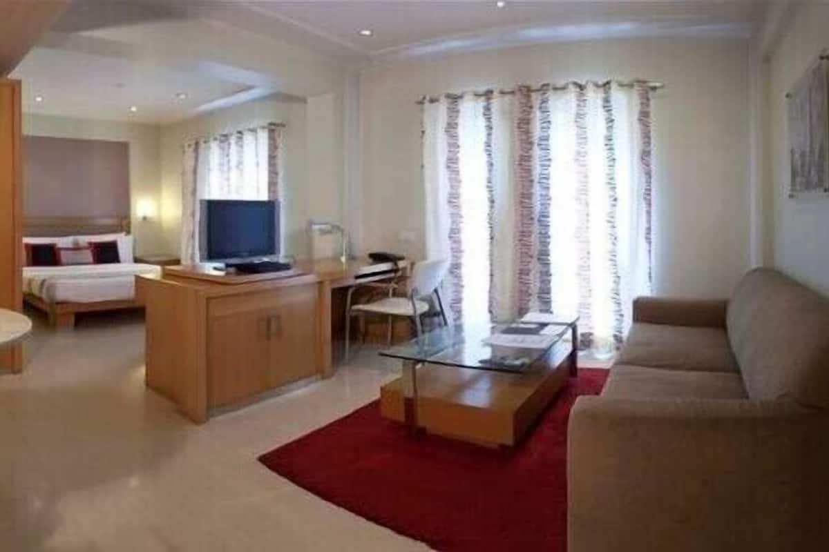 Desk, laptop workspace, blackout curtains, iron/ironing board