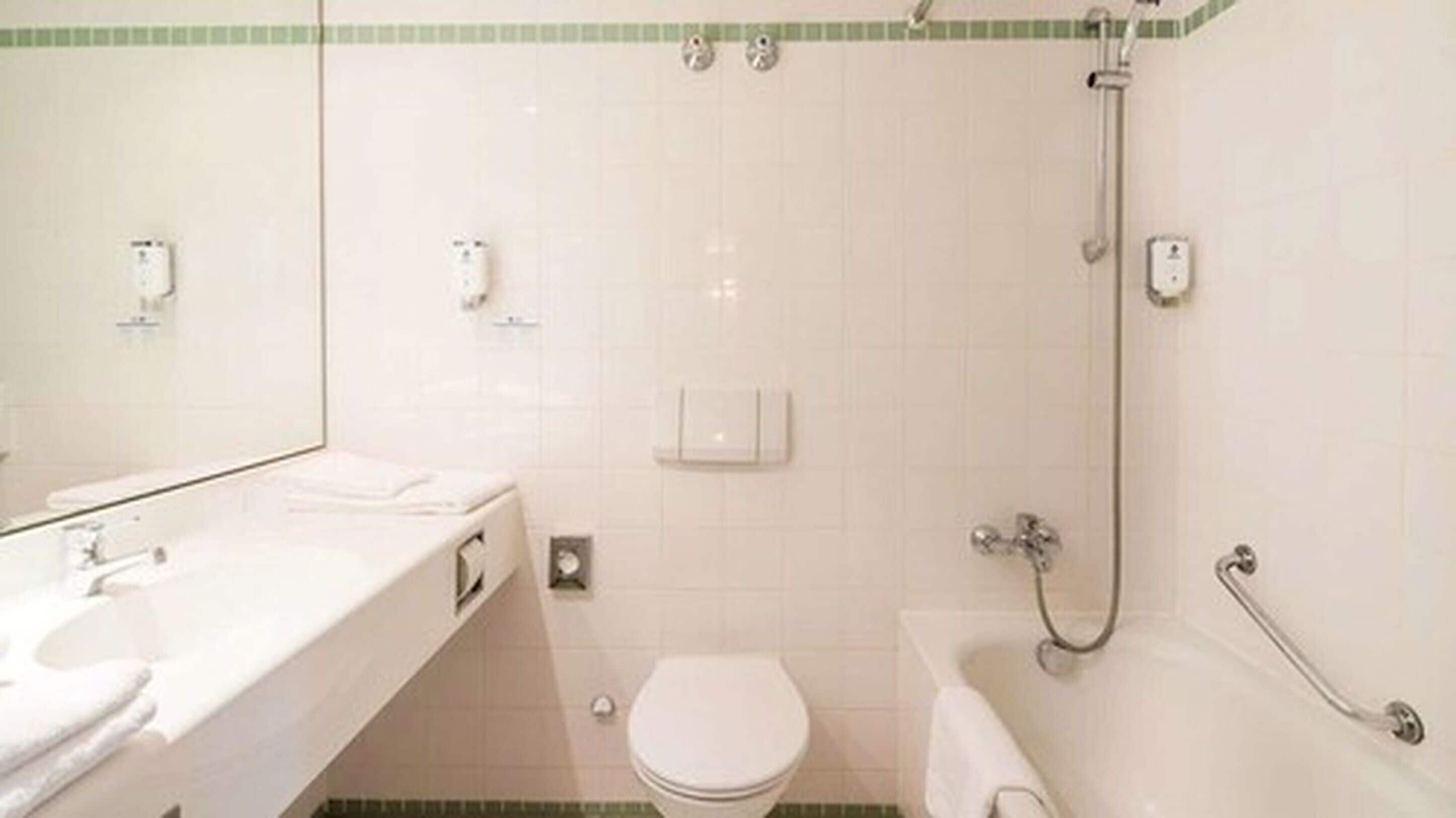 bathtub, free toiletries, towels, soap