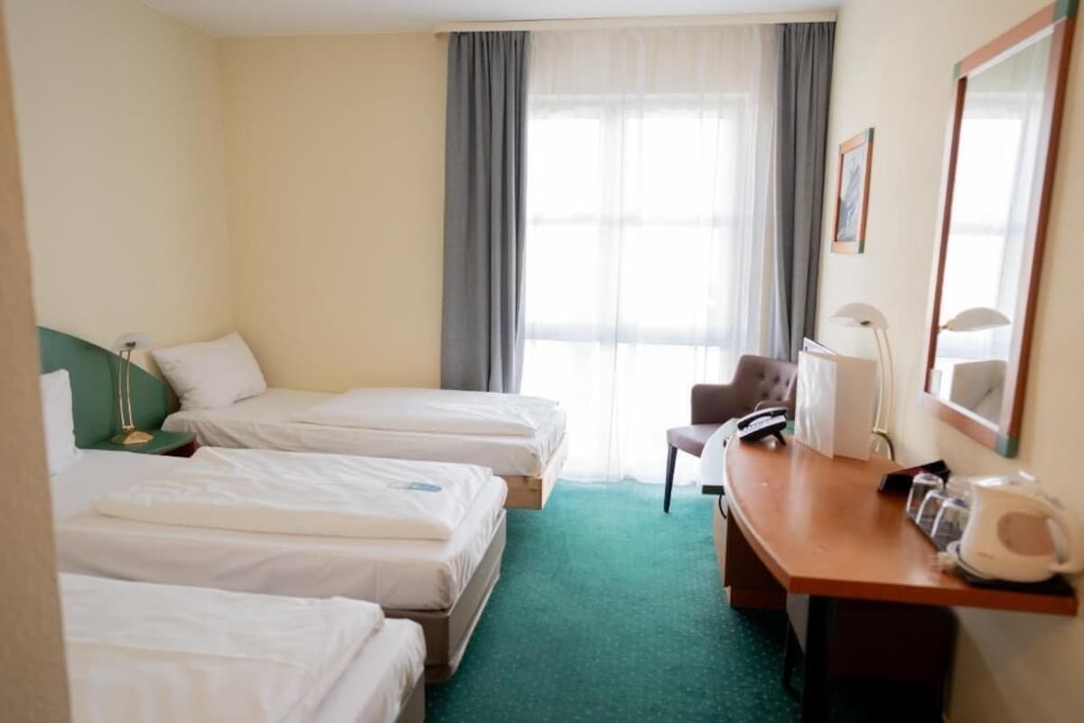 Standard Triple Room | Hypo-allergenic bedding available, desk, soundproofing