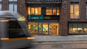 A modern building with the name "Dominick Place" on its facade. - Dominick Place (Dublin)