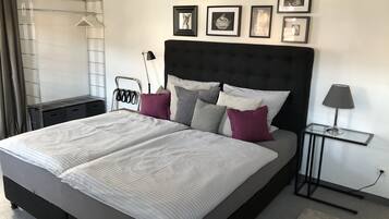 Apartemen Keluarga, 1 kamar tidur | 1 kamar tidur, seprai premium, meja kerja, dan tirai kedap cahaya