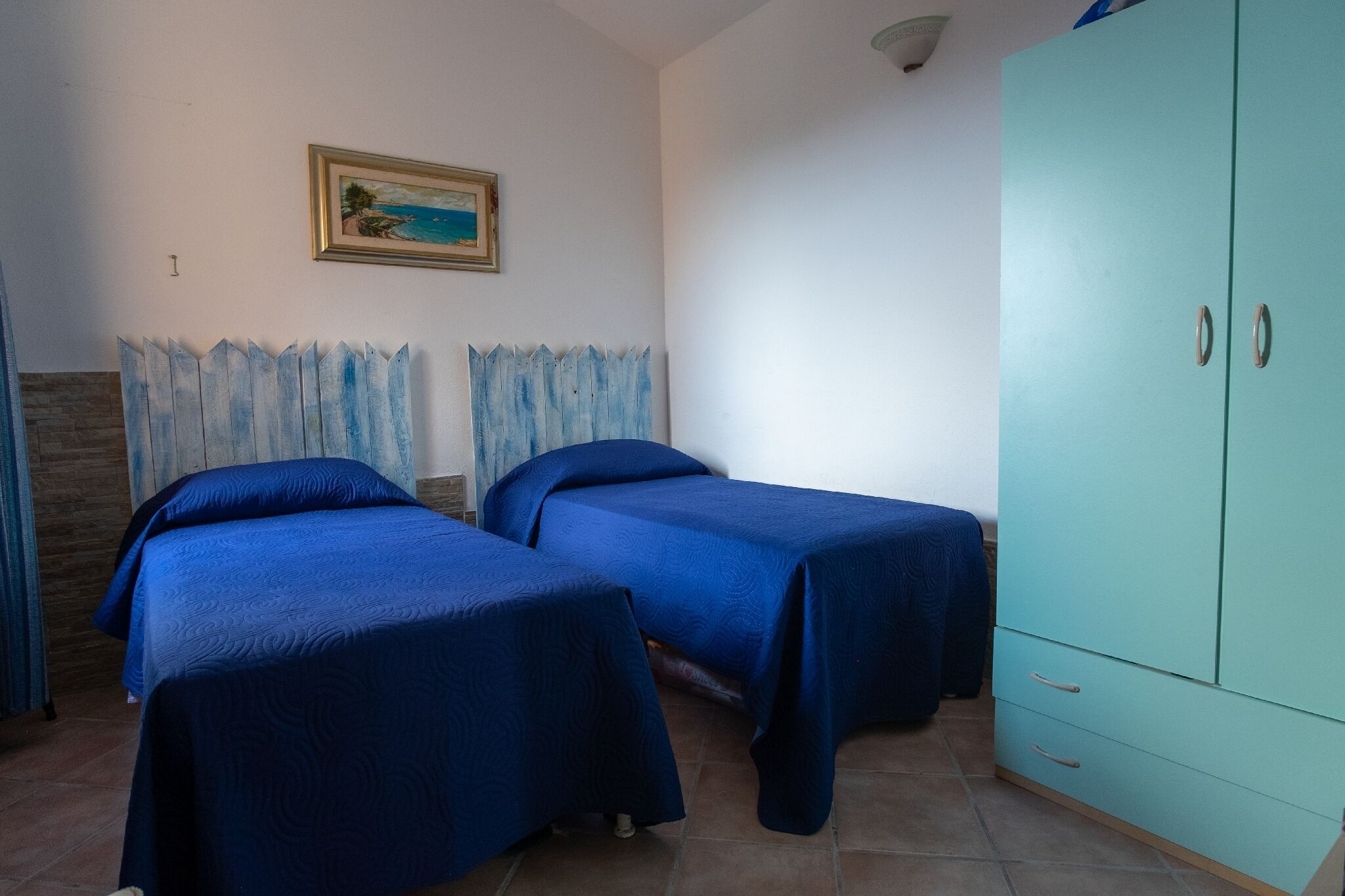 Apartamento, 1 habitación, patio, vistas al mar | 2 dormitorios, cunas (de pago), ropa de cama