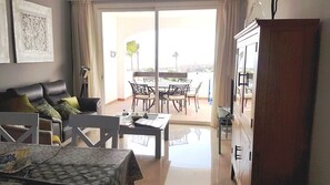 TV, books, stereo - Modern 2 Bed ,2 bathroom refurbished apartment , outstanding sea and golf views (Manilva)