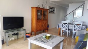 TV, books, stereo - Modern 2 Bed ,2 bathroom refurbished apartment , outstanding sea and golf views (Manilva)