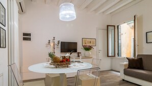 City Apartment, 1 Bedroom | Living area | 32-inch flat-screen TV with digital channels, TV - Ca Rettore (Venice)