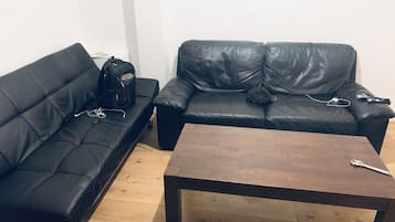 Apartment, Multiple Beds | Living room | 30-inch flat-screen TV with digital channels, TV