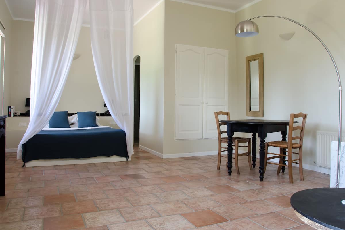 Deluxe Room, Garden View, Garden Area | Premium bedding, minibar, in-room safe, free WiFi