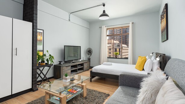 Grand Studio | Living area | Flat-screen TV