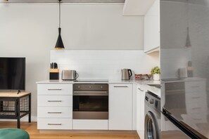 Grand Apartment | Private kitchen | Full-sized fridge, microwave, oven, stovetop - Docklands 321 (Cape Town)