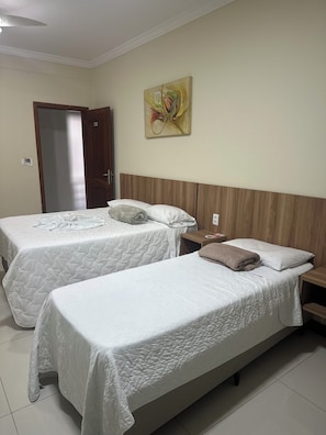 Executive Triple Room | Blackout drapes, free WiFi, bed sheets