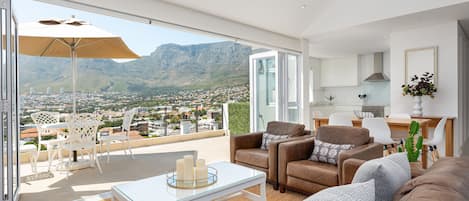 Grand House, 2 Bedrooms | Living room | 32-inch flat-screen TV with satellite channels, TV