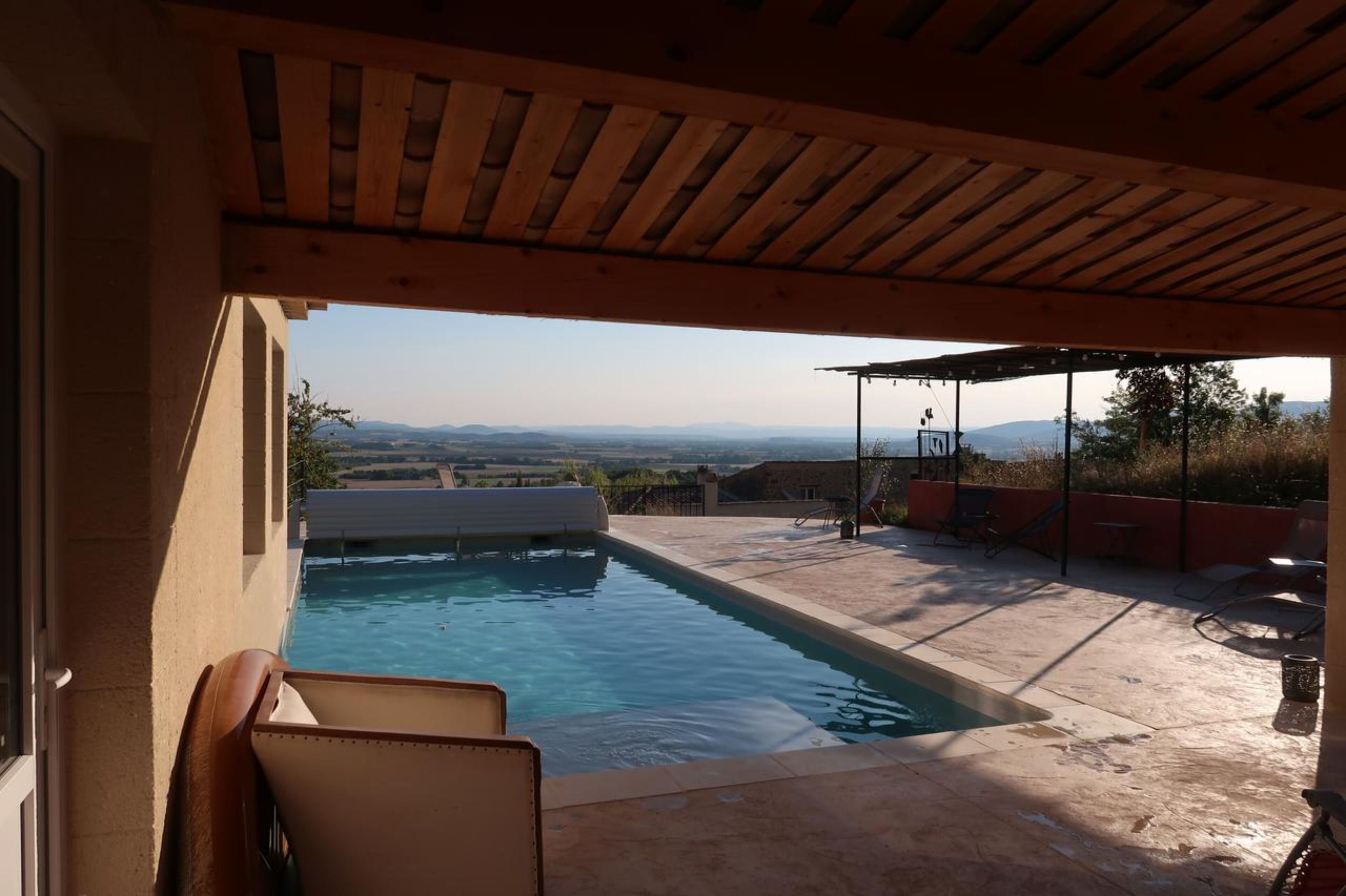 Seasonal outdoor pool, open 10:00 AM to 7:00 PM, pool umbrellas