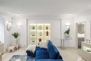 Presidential Apartment | Living area | Flat-screen TV, heated floors