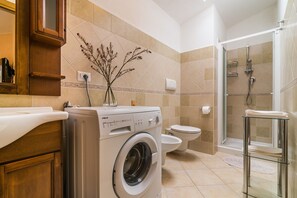 Apartment, 2 Bedrooms | Bathroom | Shower, rainfall showerhead, hair dryer, bidet