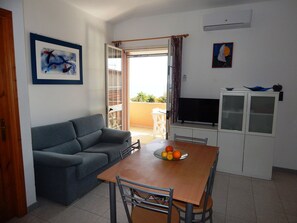 Apartment, 2 Bedrooms | Living area | TV - Casa Palombo (Posada)