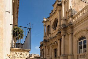 A historic building with ornate architecture, including columns and decorative moldings.