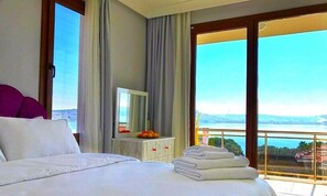 Habitación Deluxe, 1 habitación, vista al mar | Sábanas de algodón egipcio, ropa de cama de alta calidad y wifi gratis 