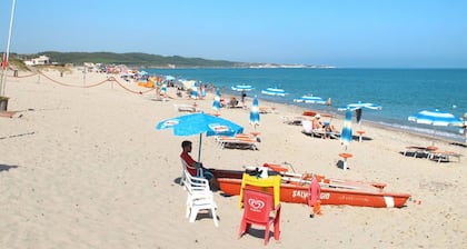 Estupenda casa de vacaciones privada con A/C, TV, terraza, mascotas permitida y aparcamiento