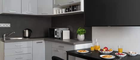 Comfort Apartment | Private kitchen | Mini-fridge, microwave, stovetop, espresso maker