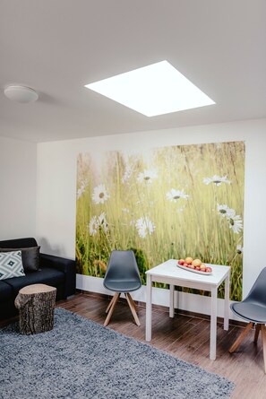 Comfort Quadruple Room | Living area | TV - Apartments Zelny Trh III (Brno)