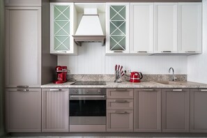 Apartment | Private kitchen | Fridge, microwave, stovetop, dishwasher