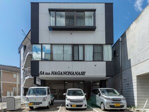 A multi-story building with a sign reading 'SA inn NAGANONANASE.' There are three cars parked in front. - Twin Room Nonsmoking w Parking 13min walk from JR Nagano Station Private BathToilet / Nagano Nagano (Nagano)