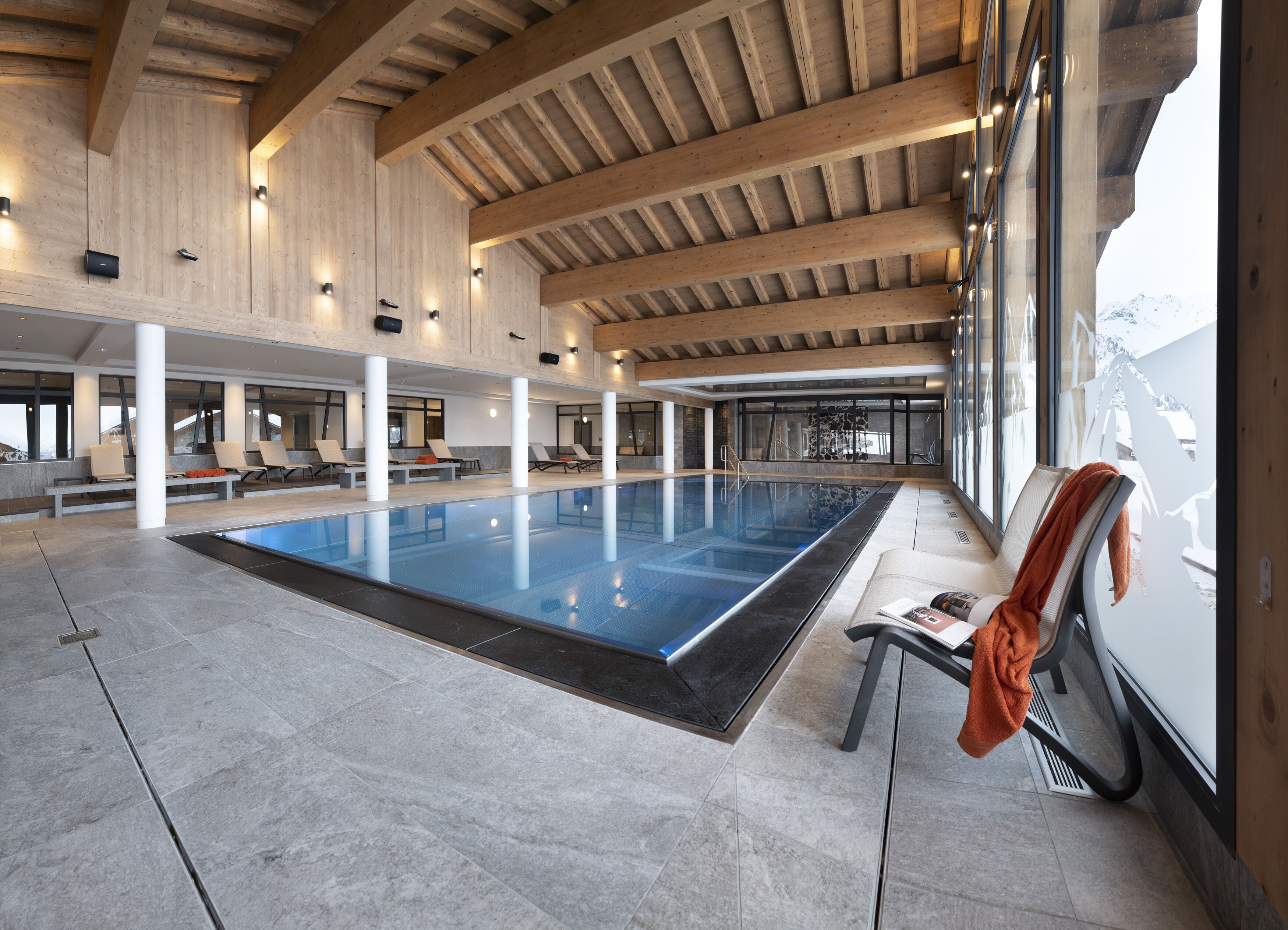 Indoor pool, open 10:00 AM to 8:00 PM, pool loungers