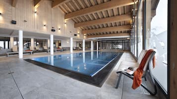 Indoor pool, open 10:00 AM to 8:00 PM, pool loungers