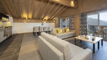 Executive Apartment (Suite) | Living area | 30-inch flat-screen TV with satellite channels, TV