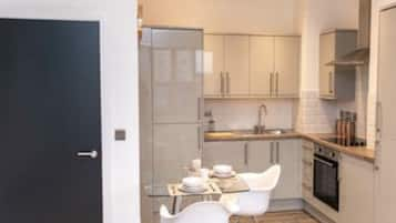 Duplex Apartment | Private kitchen | Full-sized fridge, microwave, oven, stovetop