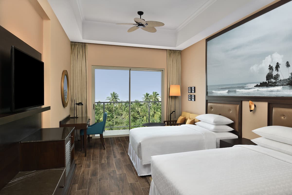 Premium bedding, down comforters, pillowtop beds, minibar