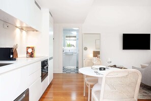 Fridge, microwave, oven, stovetop - Modern and Cosy Inner West Apartment (Lewisham)