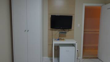 Quarto triplo conforto | Frigobar, Wi-Fi de cortesia, roupa de cama