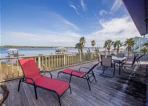 Outdoor dining - Private heated pool overlooking the lagoon. 2:00 check-in. (gulf shores)