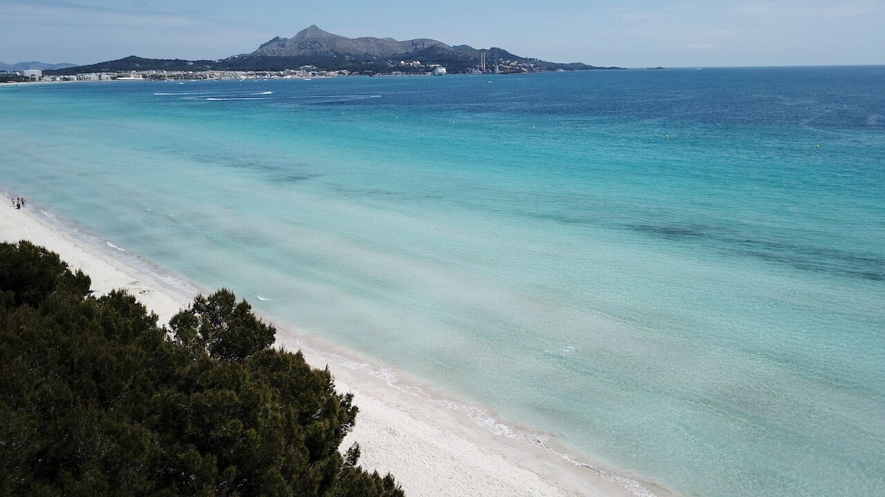 On the beach, beach towels